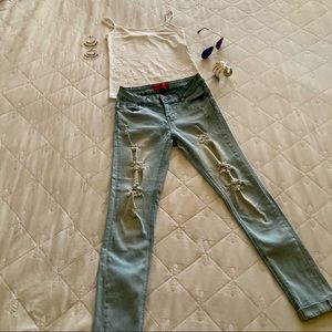 Light wash distressed jeans with some butt lift-0